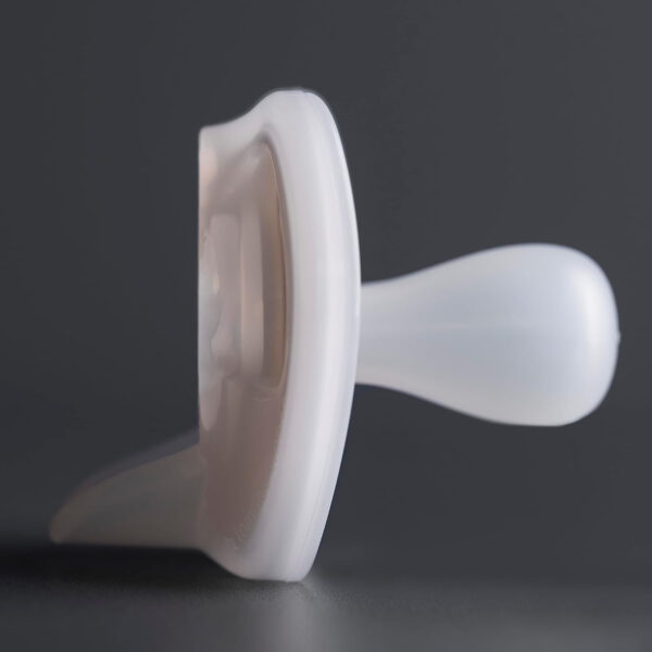 Tommee Tippee Ultra-Light Silicone Pacifier, 0-6 Months, Symmetrical One-Piece Design, BPA-Free Silicone Binkies, Clear/Blue/Green, Pack of 4