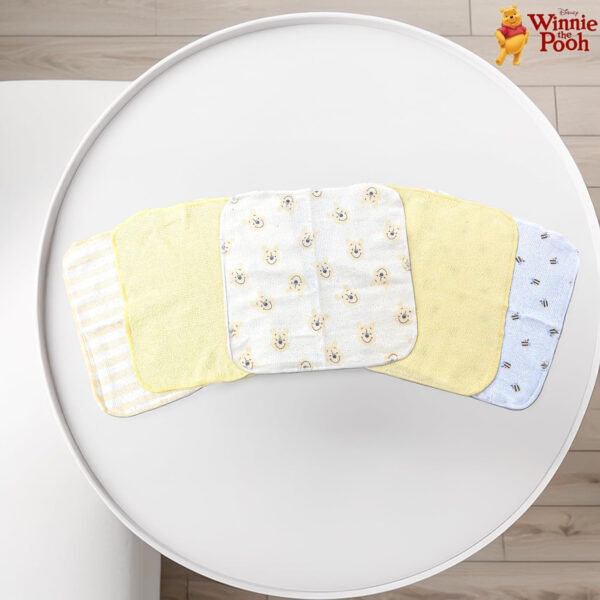 688af3fb9d4025a8645ada4e316b4f99e8685bf3264008d52c4e7.jpg Cudlie Accessories Disney Baby Winnie The Pooh Hooded Towel with 5 Piece Washcloth Set, Honey Collector Print, GS71798, Yellow