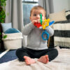 688b0625be197af42855b865bef4016efd9b742903199c551de35.jpg Baby Einstein Teether-pillar Rattle and Chill Teething Toy, Ages 3 months +