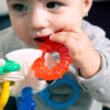 688b06271ceb46e31e46b0dab5f6046693f01eb28778f03d2830f.jpg Baby Einstein Teether-pillar Rattle and Chill Teething Toy, Ages 3 months +