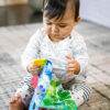 688b0644261503a74ce71407c24c9afeb7bc9a34852bf9d34f384.jpg Baby Einstein Teether-pillar Rattle and Chill Teething Toy, Ages 3 months +