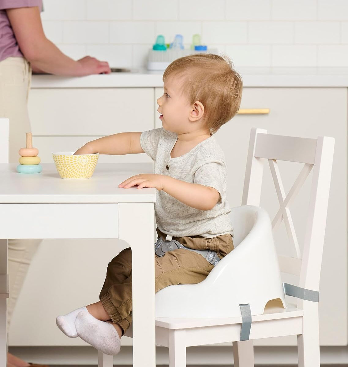 Regalo Baby Basics™ Booster Seat, White, Three-Point Safety Harness, Easily Wipeable, Sturdy & Durable Plastic